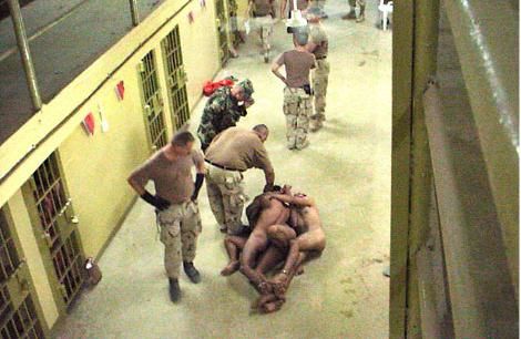 Iraqis stripped naked and chained
