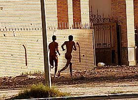 Iraqis suspected of theft forced to march through the streets naked